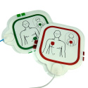 Defibrylator HeartSave AED z szafką i oznakowaniem
